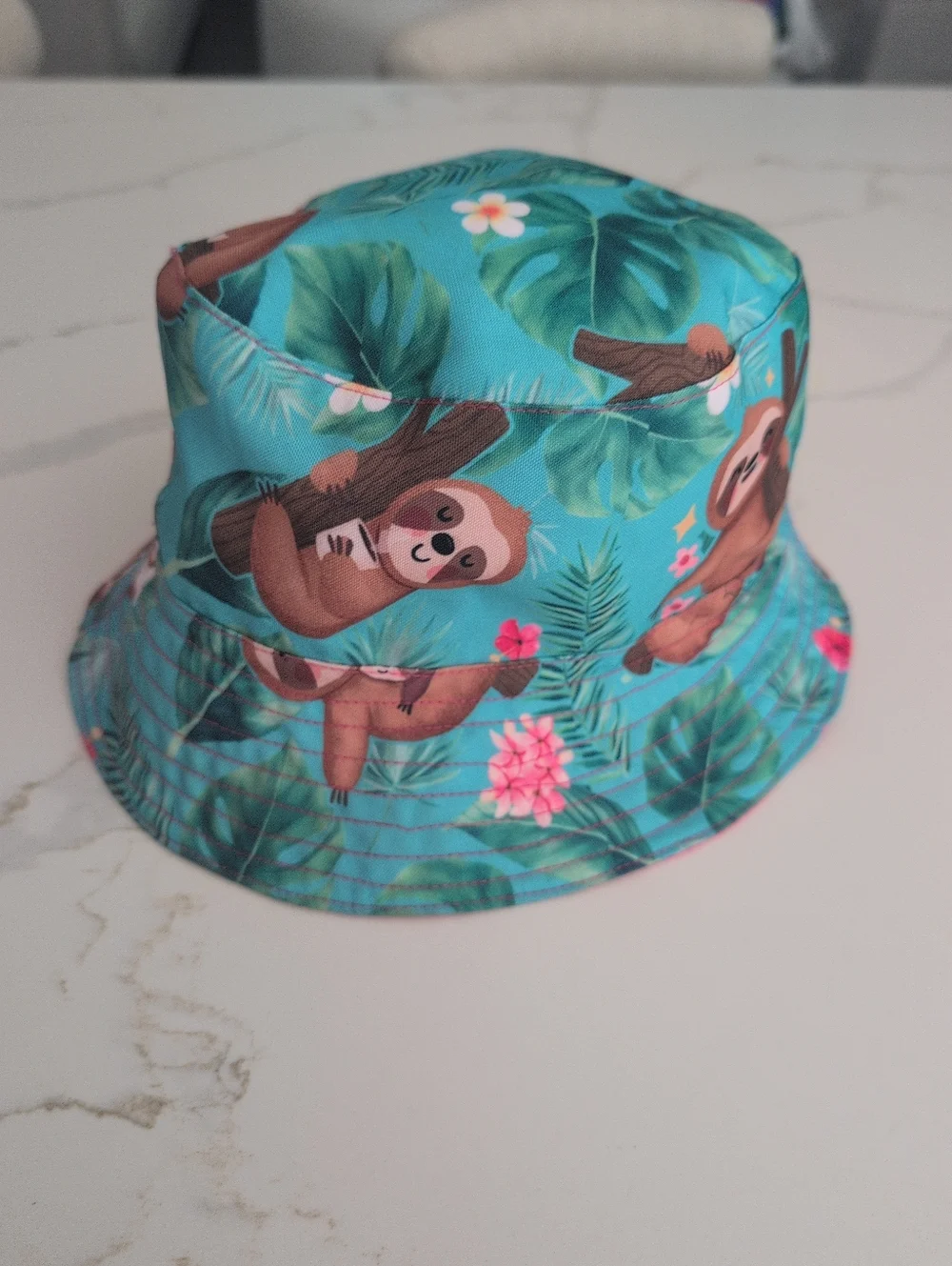 Tropical Reversible Sloth Print Bucket Hat  Turquoise/Pink